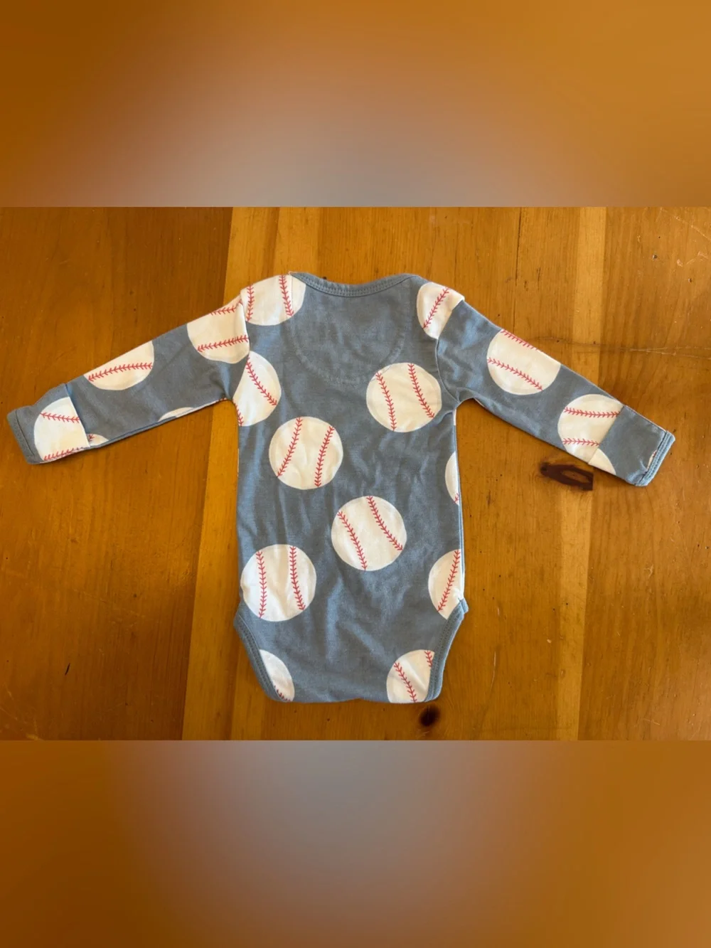 Copper Pearl long sleeve bodysuit in slugger 0-3mo